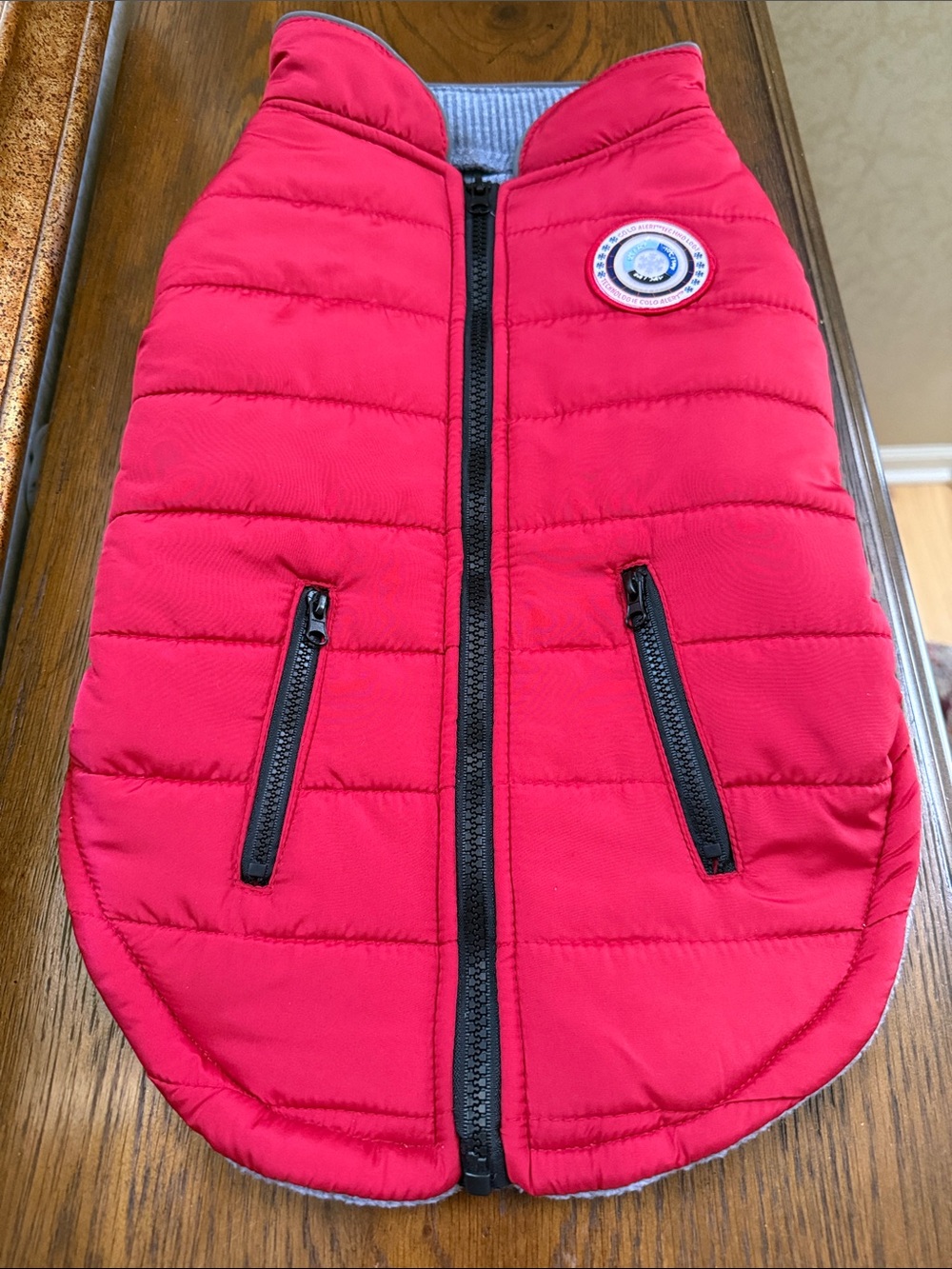 New w/o tag. LuvGear Red Quilted Dog Puffer Vest/jacket with cold alert patch.